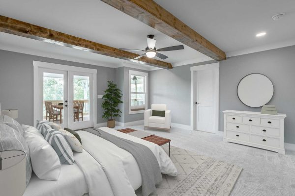 bedroom with exposed beams and access to deck for gallery